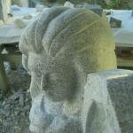 Granite angel. I start with the face. I carve what comes to mind. No models are used for this carving. It must look beautiful or I won't continue.
