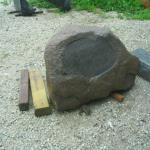 Granite boulder with new smooth surface ready for an inscription.