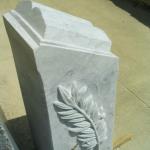 Limestone Book Monument. Here the corner chamfers can be clearly seen giving the impression the book is resting on a podium.